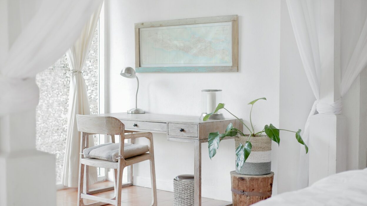 empty desk near curtain